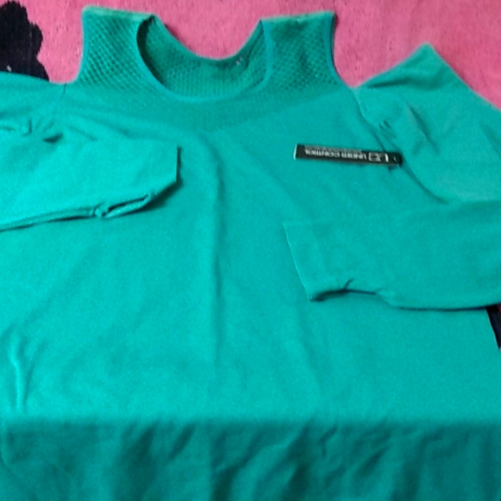 NWT womans Spandex top teal color